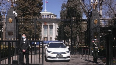 A Chinese paramilitary policeman stands guard a the entrance to the Russian Embassy in Beijing on Tuesday, March 1, 2022. As the West condemns Russia, President Vladimir Putin has vocal supporters in China, where the ruling Communist Party tells its people they are a fellow target of U.S.-led harassment. Public sentiment largely reflects the stance of a ruling party that is the closest thing Putin has to a major ally: The war should stop but the United States is to blame. (AP) A Chinese paramilitary policeman stands guard a the entrance to the Russian Embassy in Beijing on Tuesday, March 1, 2022. As the West condemns Russia, President Vladimir Putin has vocal supporters in China, where the ruling Communist Party tells its people they are a fellow target of U.S.-led harassment. Public sentiment largely reflects the stance of a ruling party that is the closest thing Putin has to a major ally: The war should stop but the United States is to blame. (AP)