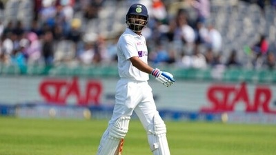 India's Virat Kohli walks back after his dismissal during the first test match between India and Sri Lanka in Mohali, India, Friday, March 4, 2022. (AP) India's Virat Kohli walks back after his dismissal during the first test match between India and Sri Lanka in Mohali, India, Friday, March 4, 2022. (AP)