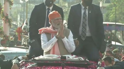 Prime Minister Narendra Modi greets supporters during his roadshow in Varanasi (Twitter/BJP) Prime Minister Narendra Modi greets supporters during his roadshow in Varanasi (Twitter/BJP)