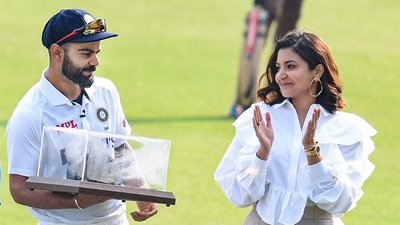 Indian cricketer Virat Kohli with wife Anushka after being honoured by the Punjab Cricket Association (PCA) for becoming the 13th Indian cricketer to play 100 Test matches, at IS Bindra PCA Stadium, Mohali. (PTI ) Indian cricketer Virat Kohli with wife Anushka after being honoured by the Punjab Cricket Association (PCA) for becoming the 13th Indian cricketer to play 100 Test matches, at IS Bindra PCA Stadium, Mohali. (PTI )