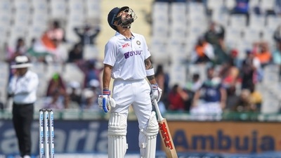 Every pair of eyes in Mohali trained on Virat Kohli, cameras ready to capture even a batting eyelid. (PTI) Every pair of eyes in Mohali trained on Virat Kohli, cameras ready to capture even a batting eyelid. (PTI)