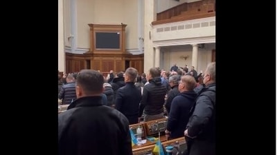 Ukraine parliamentarians singing the national anthem at a secret sitting of the parliament on Thursday.&nbsp;