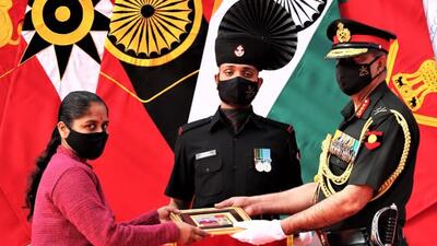 Kin of an officer being honoured during Western Command’s investiture ceremony at Mamun near Pathankot. (HT Photo)