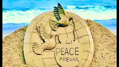 Padma Shri Sudarsan Pattnaik, has created a few sand artworks appealing for peace amid the ongoing Ukraine-Russia conflict. Padma Shri Sudarsan Pattnaik, has created a few sand artworks appealing for peace amid the ongoing Ukraine-Russia conflict.