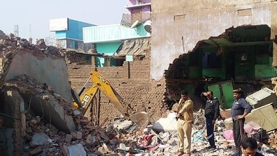 Bhagalpur, Mar 04 (ANI): Police personnel inspect the site after a massive explosion ripped through a three-storey building near the Kajwali Chak area under Tatarpur Police station on Thursday night, in Bhagalpur on Friday. (ANI Photo) (Aftab Alam Siddiqui) Bhagalpur, Mar 04 (ANI): Police personnel inspect the site after a massive explosion ripped through a three-storey building near the Kajwali Chak area under Tatarpur Police station on Thursday night, in Bhagalpur on Friday. (ANI Photo) (Aftab Alam Siddiqui)