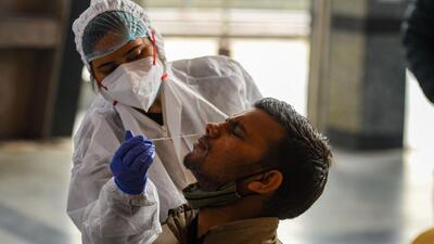 A health worker collects a swab sample for Covid-19 test in New Delhi. (Amal KS/HT Archive) A health worker collects a swab sample for Covid-19 test in New Delhi. (Amal KS/HT Archive)