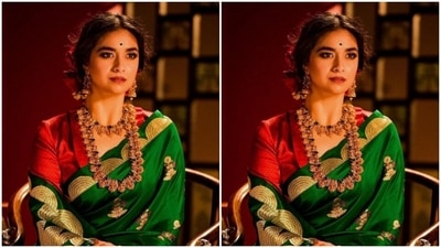 Styled by fashion stylist Archa Mehta, Keerthy wore her tresses into a bun with a middle part and decorated her hairdo with red roses. In nude eyeshadow, black eyeliner, mascara-laden eyelashes, drawn eyebrows, contoured cheeks, red lipstick and a small black bindi, Keerthy looked stunning. (Instagram/@keerthysureshofficial)