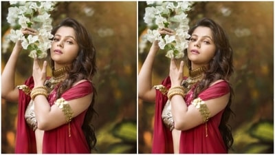 Rubina decked up in a gold and red blouse with halter neck. She paired it with a red satin skirt detailed with pleats. With a red satin throw around her arms, Rubina completed her look. (Instagram/@rubinadilaik)