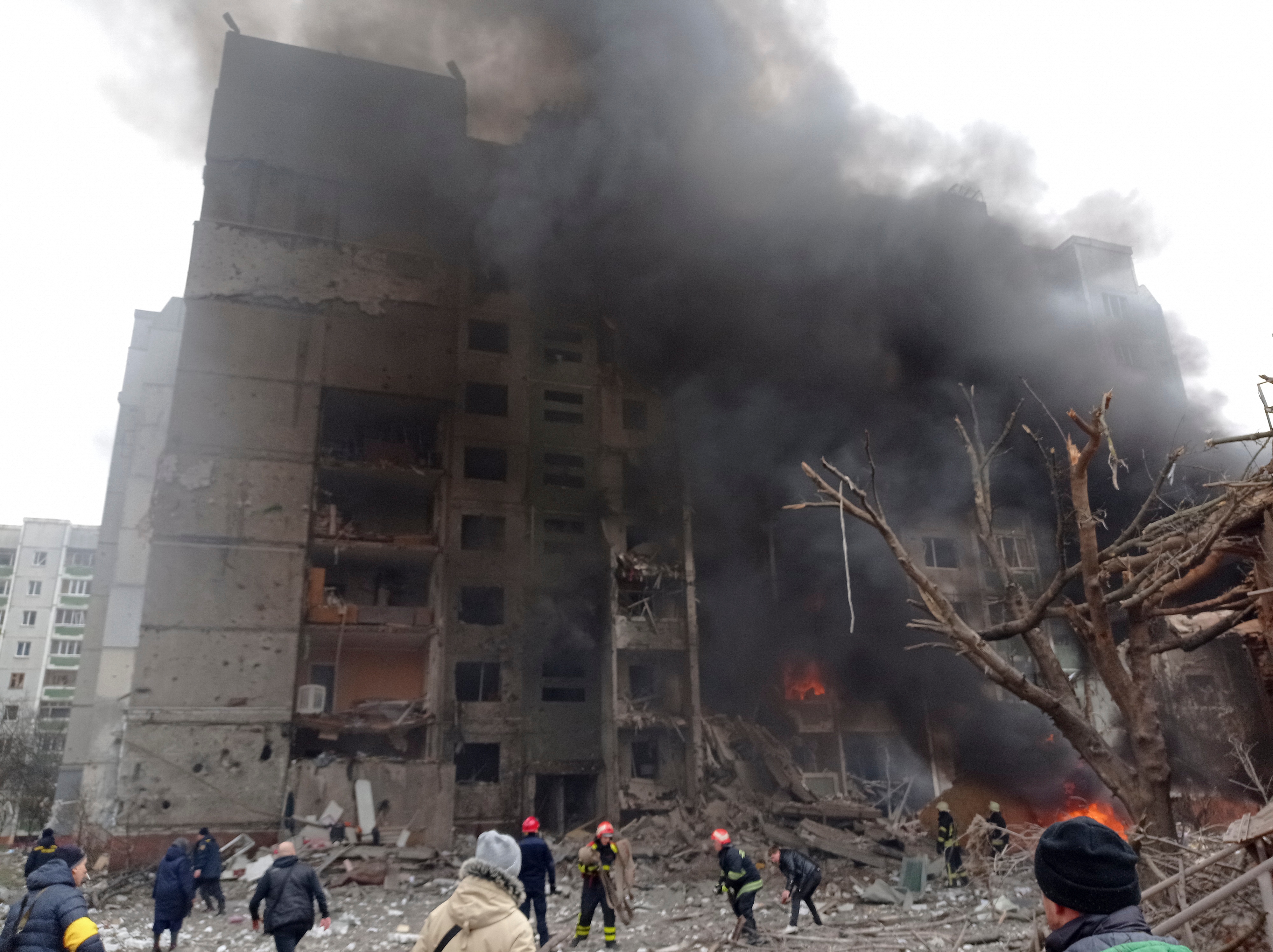 Firefighters work to extinguish a fire at a damaged city center after a Russian air raid in Chernigiv, Ukraine, Thursday, March 3, 2022. (AP) Firefighters work to extinguish a fire at a damaged city center after a Russian air raid in Chernigiv, Ukraine, Thursday, March 3, 2022. (AP)