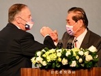 Former US secretary of state Mike Pompeo (L) bumps fists with former Taiwan foreign minister Mark Chen before delivering a speech in Taipei. Former US secretary of state Mike Pompeo (L) bumps fists with former Taiwan foreign minister Mark Chen before delivering a speech in Taipei.