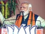 Prime Minister Narendra Modi addressing a public rally for the seventh and last phase of Uttar Pradesh Assembly elections, at Khajuri Village, Rajatalab, in Varanasi on Saturday. (AGENCY)