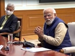 PM Narendra Modi being briefed by senior officials at the high-level meeting as EAM S Jaishankar looks on.