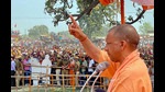 Chief minister Yogi Adityanath addressing a public meeting for the ongoing Uttar Pradesh Assembly elections, in Bhadohi district. (PTI)