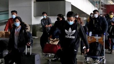 Indian nationals arrive after being evacuated from war-torn Ukraine under Operation Ganga at IGI Terminal 3 Airport, in New Delhi on Friday. (ANI)