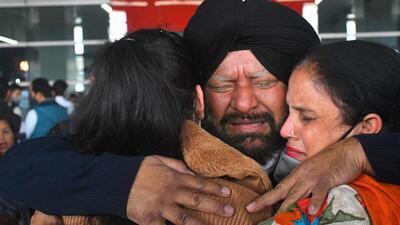 An Indian student, evacuated from war-torn Ukraine, reunites with her family at the Indira Gandhi International Airport in New Delhi on Saturday. (PTI)