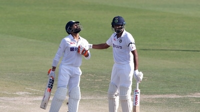 India's Ravindra Jadeja celebrates his century with Ravichandran Ashwin. (ANI)