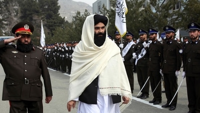 Taliban acting Interior Minister Sirajuddin Haqqani, center, reviews new Afghan police recruits during a graduation ceremony at the police academy in Kabul, Afghanistan. (AP) Taliban acting Interior Minister Sirajuddin Haqqani, center, reviews new Afghan police recruits during a graduation ceremony at the police academy in Kabul, Afghanistan. (AP)