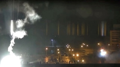 Surveillance camera footage shows a flare landing at the Zaporizhzhia nuclear power plant during shelling in Enerhodar, (Zaporizhzhya NPP via REUTERS)