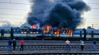 Meerut: Flames rise after a fire broke out in the Saharanpur-Delhi passenger train, at the Daurala railway station in Meerut, Saturday. (PTI)