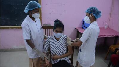 Teenage beneficiaries in the 15-18 years age group get inoculated against Covid-19 at he District Nursing Training College Vaccination Centre, in Thane, Mumbai, on Friday. (HT PHOTO.) Teenage beneficiaries in the 15-18 years age group get inoculated against Covid-19 at he District Nursing Training College Vaccination Centre, in Thane, Mumbai, on Friday. (HT PHOTO.)