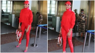 Deepika rounded off the ensemble with a matching red baseball cap that lent a cool vibe to her glamorous athleisure ensemble. In the end, a messy bun rounded off the star's hairdo. (HT Photo/Varinder Chawla) Deepika rounded off the ensemble with a matching red baseball cap that lent a cool vibe to her glamorous athleisure ensemble. In the end, a messy bun rounded off the star's hairdo. (HT Photo/Varinder Chawla)