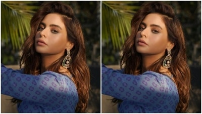 Aamna paired a midriff-baring blue silk blouse with full sleeves and embroidery details with a long blue flowy skirt. Aamna's skirt came with a blue thread detail at the waist that added more grace to her outfit. (Instagram/@aamnasharifofficial)
