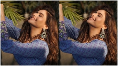 Styled by celebrity hairstylist Sayed Saba, Aamna wore her tresses open in wavy curls with a side part as she posed under the sun. (Instagram/@aamnasharifofficial)