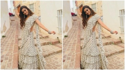Here's a pretty picture of Keerthy Suresh dancing on the streets, looking just too stunning. (Instagram/@keerthysureshofficial)