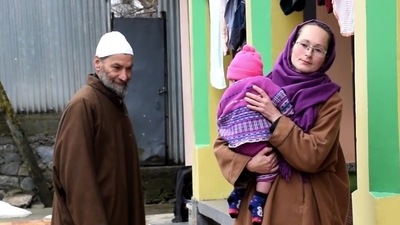 Oliza, a Ukrainian national married to a Kashmiri, who lives in J&K's Pulwama. Oliza, a Ukrainian national married to a Kashmiri, who lives in J&K's Pulwama.