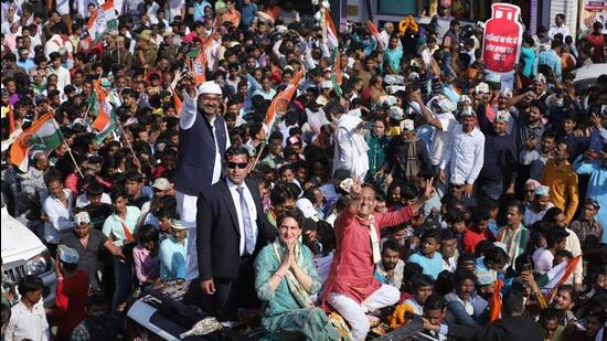 Congress leader Priyanka Gandhi Vadra taking out a roadshow for the UP polls in Jaunpur on Saturday. (PTI PHOTO)