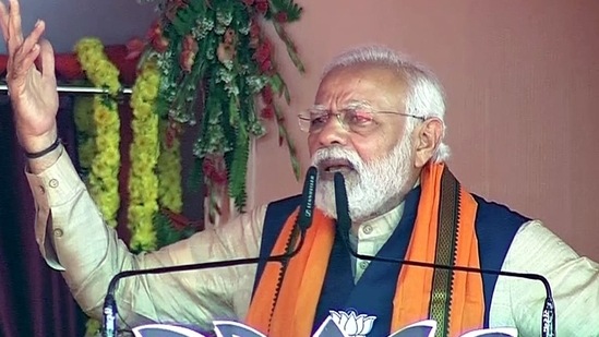 Prime Minister Narendra Modi addressing a public rally for the seventh and last phase of Uttar Pradesh Assembly elections, at Khajuri Village, Rajatalab, in Varanasi on Saturday. (AGENCY)