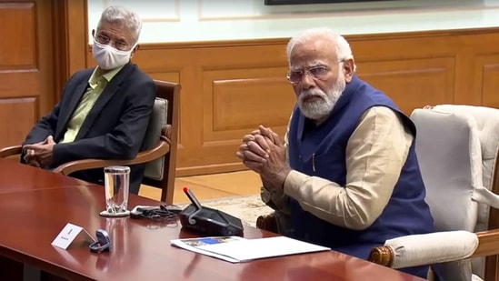 PM Narendra Modi being briefed by senior officials at the high-level meeting as EAM S Jaishankar looks on.