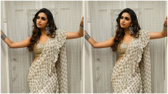 In silver jhumkas and bangles from the shelves of Minerali Store, Keerthy aced her ethnic look to perfection.(Instagram/@keerthysureshofficial)