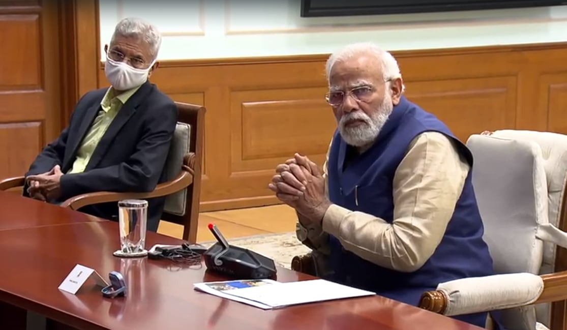 PM Narendra Modi being briefed by senior officials at the high-level meeting as EAM S Jaishankar looks on.