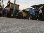 Security forces seen at the site of a grenade explosion at Hari Singh High Street in Srinagar on Sunday. Security forces seen at the site of a grenade explosion at Hari Singh High Street in Srinagar on Sunday. 