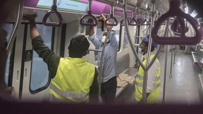 Men work inside a metro coach at a car depot at Kothrud. Pune Metro which will be inaugurated by Prime Minister Narendra Modi at 11.30 am at Garware College station on March 6. (Pratham Gokhale/HT Photo) Men work inside a metro coach at a car depot at Kothrud. Pune Metro which will be inaugurated by Prime Minister Narendra Modi at 11.30 am at Garware College station on March 6. (Pratham Gokhale/HT Photo)