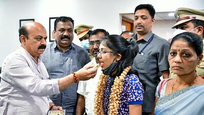 Chief minister Basavaraja Bommai welcomes medical student Chaitra Gangadhar returning from war-torn Ukraine, at Hubli airport, in Dharwad on Sunday. (ANI)