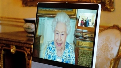 Britain's Queen Elizabeth II appears on a screen via videolink from Windsor Castle, during a virtual audience to receive the High Commissioner of Malawi, Dr. Thomas Bisika (not pictured), at Buckingham Palace in London. (Image for representation. Source: Victoria Jones / POOL / AFP) Britain's Queen Elizabeth II appears on a screen via videolink from Windsor Castle, during a virtual audience to receive the High Commissioner of Malawi, Dr. Thomas Bisika (not pictured), at Buckingham Palace in London. (Image for representation. Source: Victoria Jones / POOL / AFP)