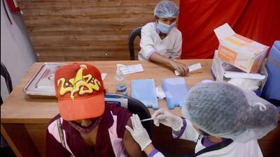 A beneficiary gets vaccinated against Covid at Annabhau Sathe Kalamandir, Yerawada in Pune. (Shankar Narayan/HT PHOTO)
