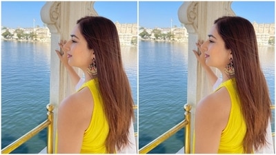 Disha's bright yellow suit features a sleeveless kurti with a round neckline, flowy silhouette, and a fitted bodice. She teamed it with matching yellow flared pants and a white zari dupatta adorned with sunflower print and bright yellow tassels. (Instagram/@dishaparmar) Disha's bright yellow suit features a sleeveless kurti with a round neckline, flowy silhouette, and a fitted bodice. She teamed it with matching yellow flared pants and a white zari dupatta adorned with sunflower print and bright yellow tassels. (Instagram/@dishaparmar)