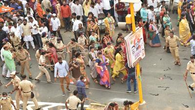 BJP and NCP workers clash in Pimpri-Chinchwad after a footwear thrown at leader of Opposition and former chief minister Devendra Fadnavis allegedly by one of people at the event on Sunday. (HT PHOTO)