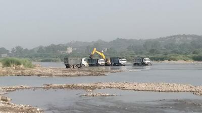 A Ropar resident had complained about illegal sand mining being carried out in the garb of desilting the Sutlej in Punjab. A Ropar resident had complained about illegal sand mining being carried out in the garb of desilting the Sutlej in Punjab.