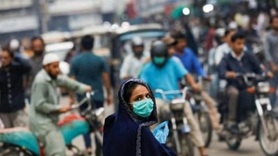 The omicron variant fuelled pandemic wave prompted public health officials to recommend more protective face coverings. (REUTERS)