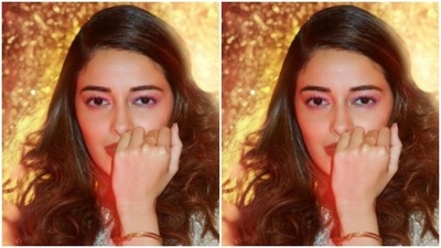 Assisted by makeup artist Stacy Gomes, Ananya decked up in pink eyeshadow, mascara-laden eyelashes, contoured cheeks and a shade of bright red lipstick. (Instagram/@ananyapanday)