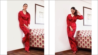 A slew of pictures flooding the Internet from her recent photoshoot, feature the diva donning a shaded print cherry red shirt that was made of satin and cotton silk fabric and came with exaggerated sleeves along with a ribbed collar.&nbsp; (Instagram/sanamratansi)
