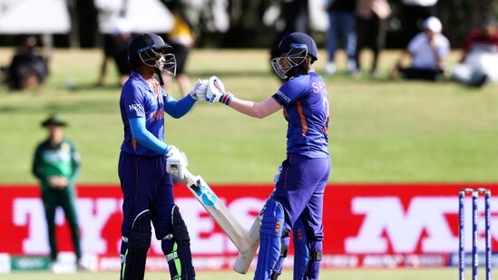 India's Pooja Vastrakar (L) and Sneh Rana in action against Pakistan during their 2022 ICC Women's World Cup match.(AFP)