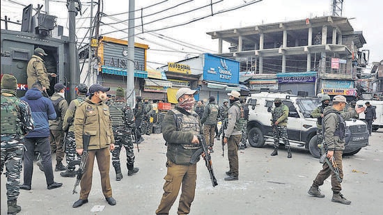 Security forces at the site of the grenade attack at a market near Amira Kadal Bridge in Srinagar on Sunday (WASEEM ANDRABI/HT) Security forces at the site of the grenade attack at a market near Amira Kadal Bridge in Srinagar on Sunday (WASEEM ANDRABI/HT)