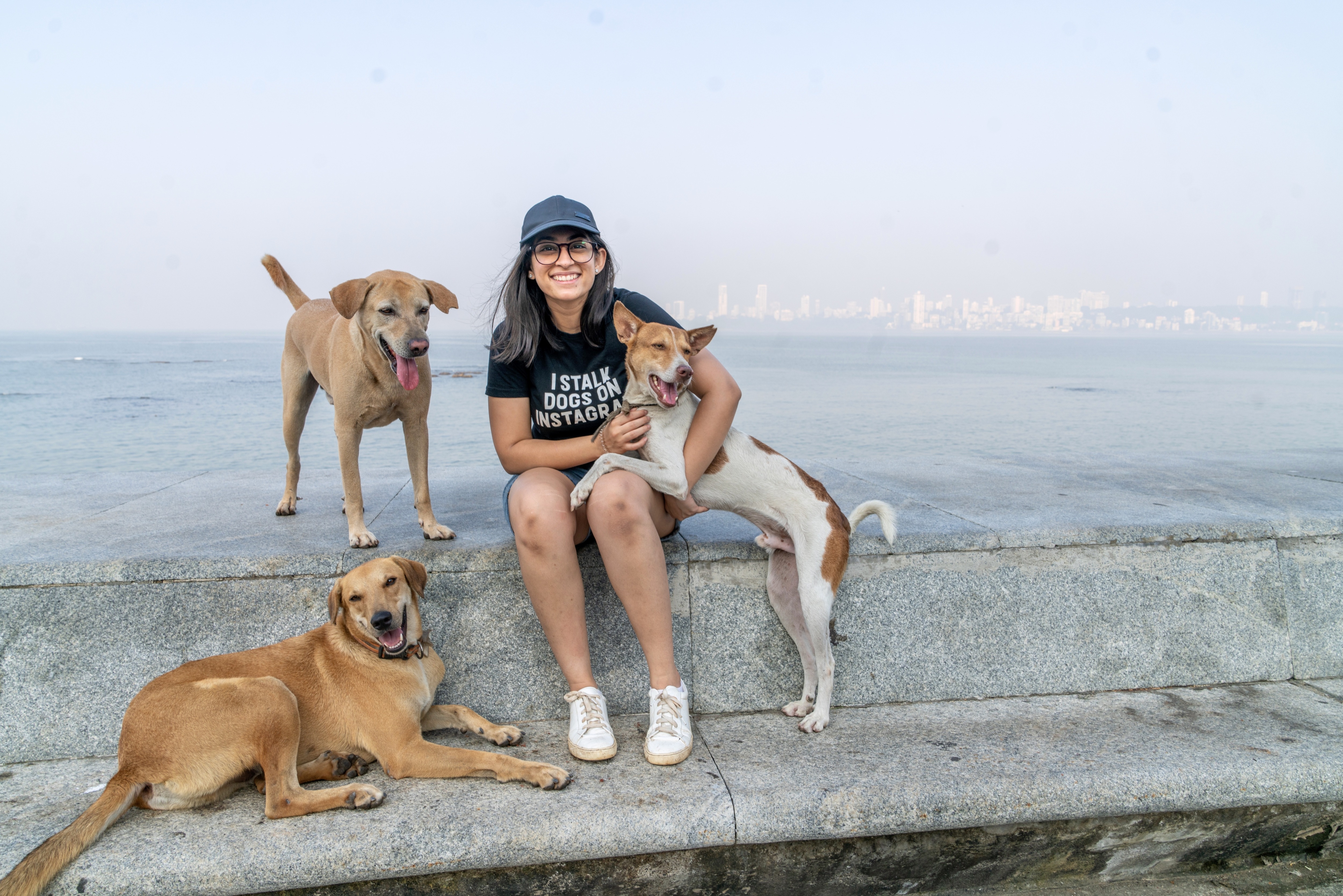 Photographer Prathima Pingali with a few dogs. (Prathima Pingali ) Photographer Prathima Pingali with a few dogs. (Prathima Pingali )