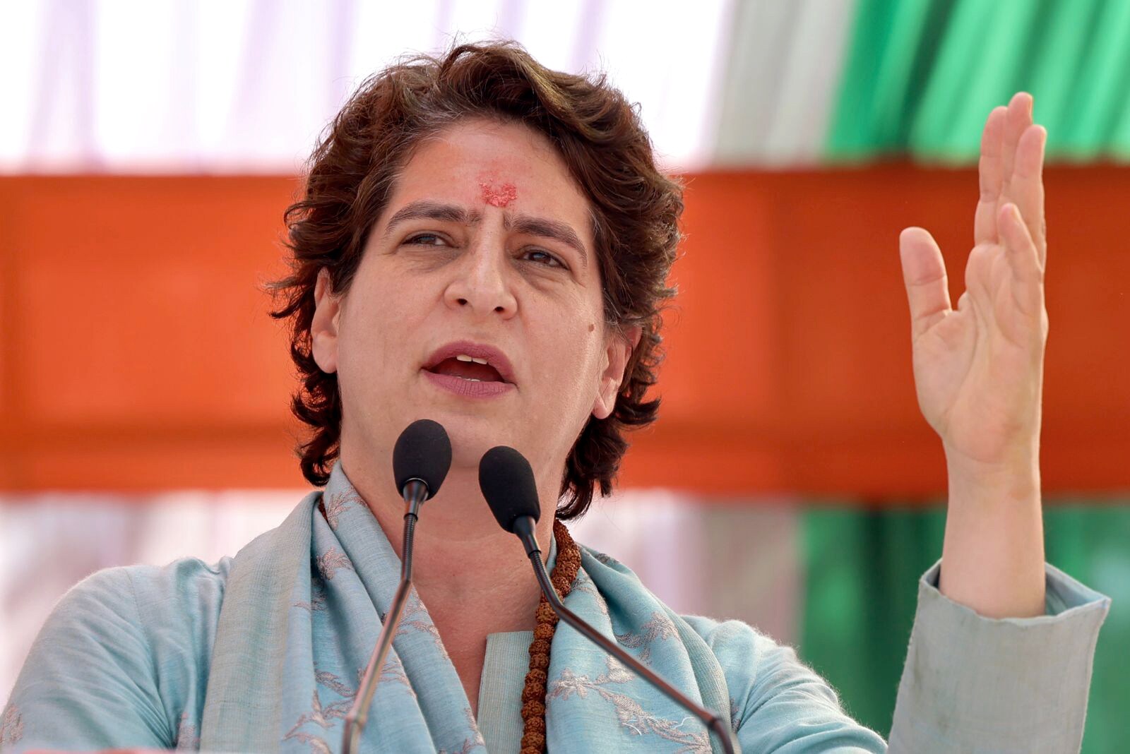 Congress general secretary Priyanka Gandhi Vadra addresses a public rally for the seventh and last phase of Uttar Pradesh Assembly elections, at Phoolpur, in Pindra on Friday, March 4, 2022. (ANI Photo)