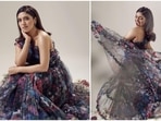 Bhumi Pednekar is excited about spring and her latest Instagram pictures in a black organza floral dress say it all. She recently took to her Instagram handle to share a slew of pictures of herself posing in the outfit.(Instagram/@bhumipednekar)